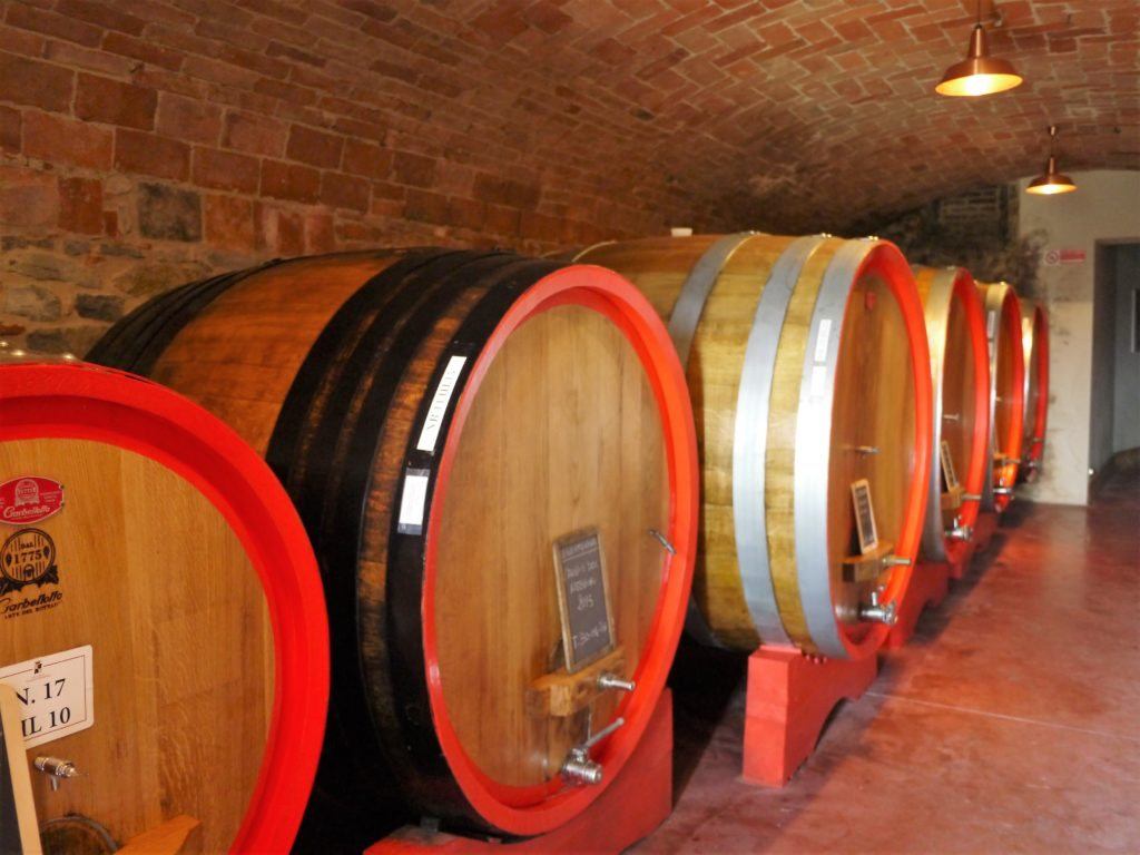 Wine barrels in the cellar at Cascina Fontana